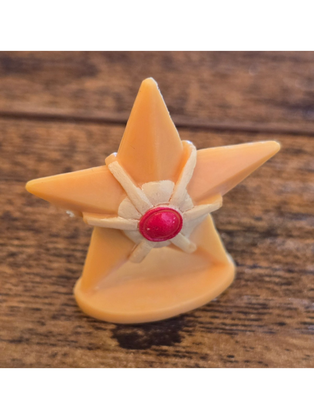 Vintage 1990s 1-inch mini figure of the Pokémon Staryu